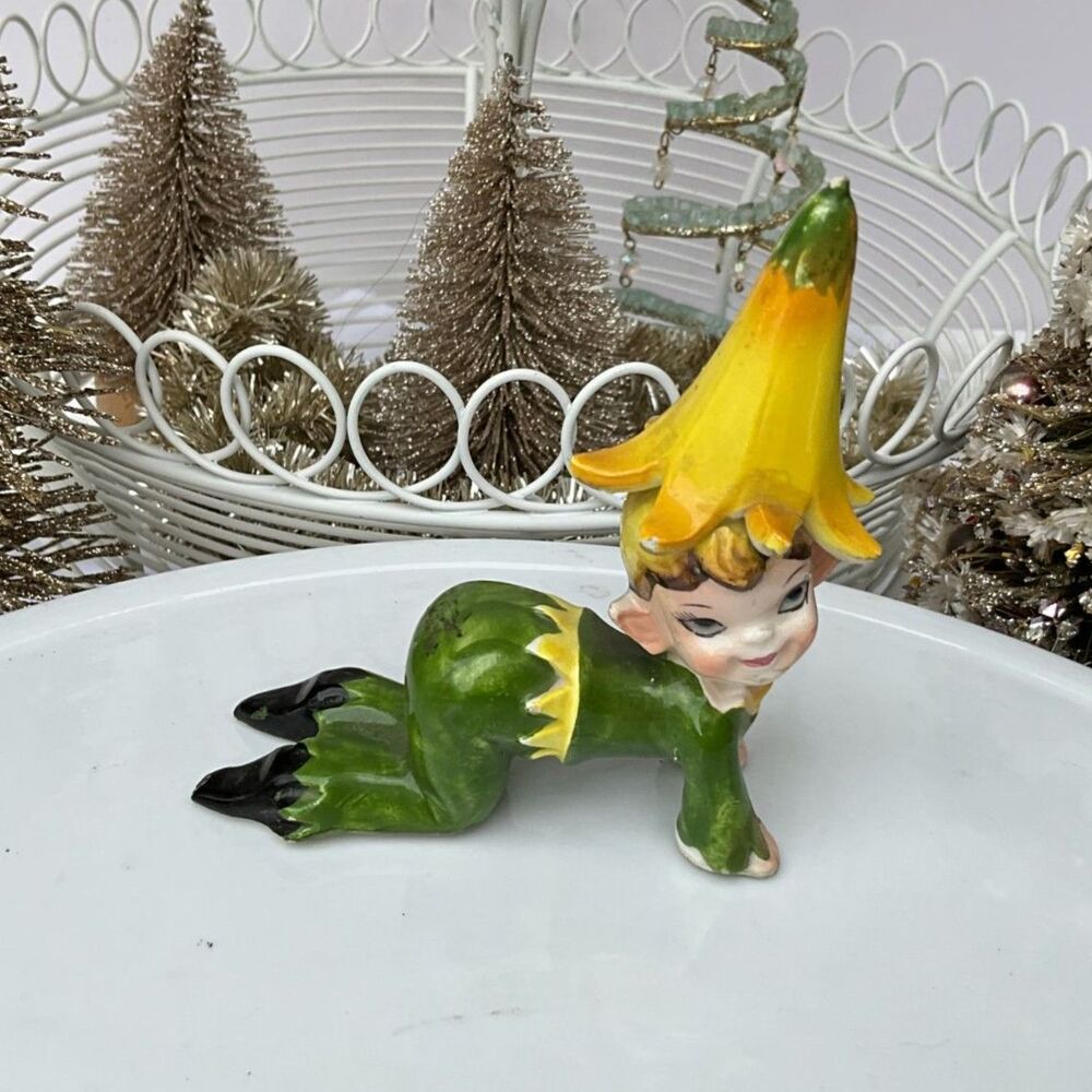 Vintage Mid Century Modern ceramic pixie elf figurine yellow flower hat must see
